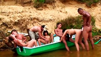 Young and beautiful people are fans of nudism and are having fun in nature