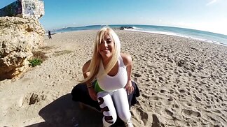 Blonde babe masturbates at the beach and gives a blowjob