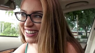 Adorable chick with glasses sucks dick and strips in a car