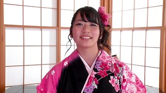 That Japanese girl looks so adorable in her kimono