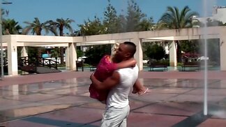 Russian blonde allows black man to play with her tits outdoors