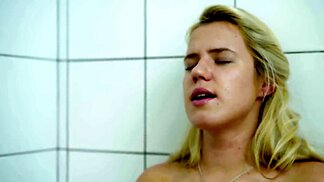 Pale blonde Taylor D getting wet in the bathroom in HD