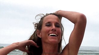Mature Exhibitionist Takes Off Bikini and Takes Nudes on Beach