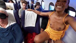 Small-titted ebony babe gets bounced on cock mid-flight