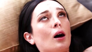Tatted brunette in lingerie gets tongue and cock on the couch