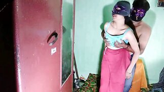 Petite Indian babe kneels down to suck cock through her mask